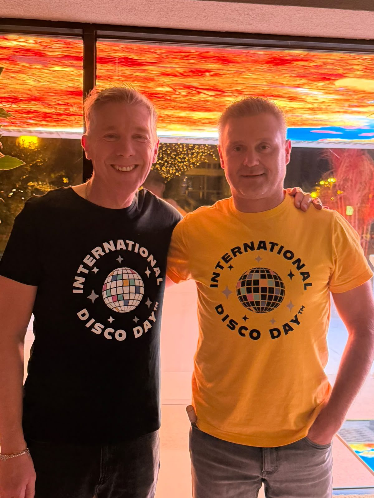 Michael Gray and Robert Ravenšćak wearing International Disco Day T-shirts in Zagreb, Croatia.